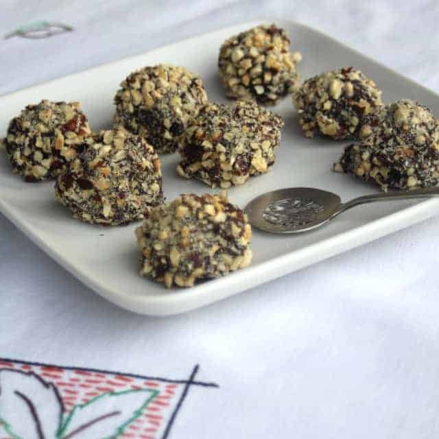 A no-bake treat full of fall flavor these dark chocolate and hazelnut pumpkin pie truffles are a delicious dessert that comes together easily.