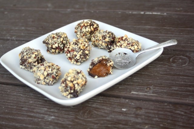 A no-bake treat full of fall flavor these dark chocolate and hazelnut pumpkin pie truffles are a delicious dessert that comes together easily. 