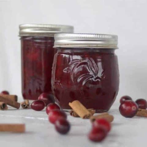 Brandied cranberry sauce in jars.