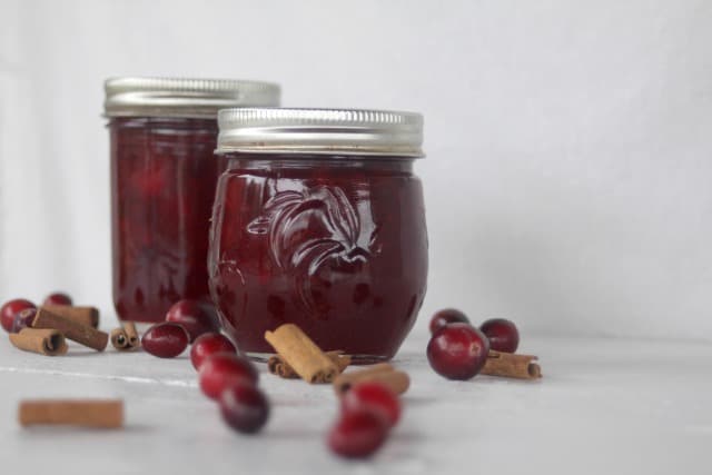 Brandied cranberry sauce in jars.