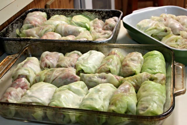 Cabbage rolls in pans ready to be baked.
