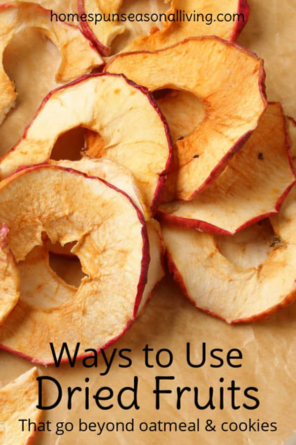 Dried apple slices on a board.