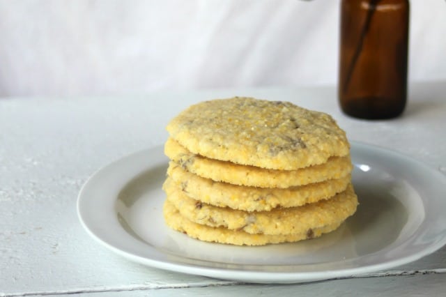 Lilac cornmeal cookies on a plate.