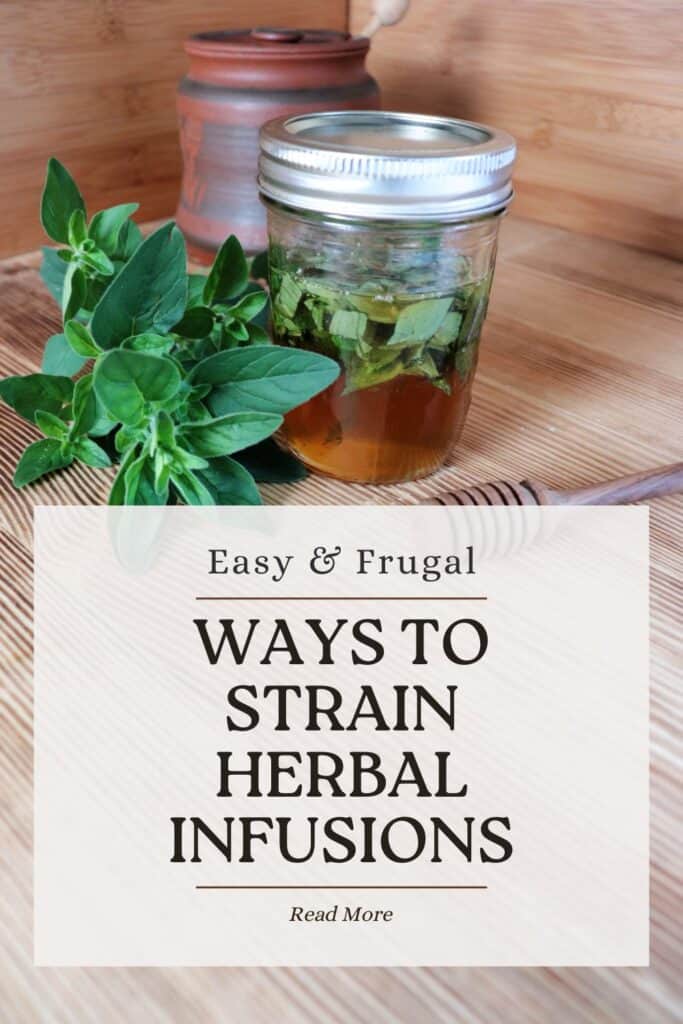 A jar filled with herbs and honey stis on a counter with fresh oregano next to it. A text overlay reads: Easy & frugal ways to strain herbal infusions. 