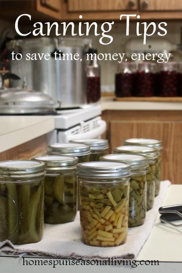 Jars of home canned goods on a kitchen counter.