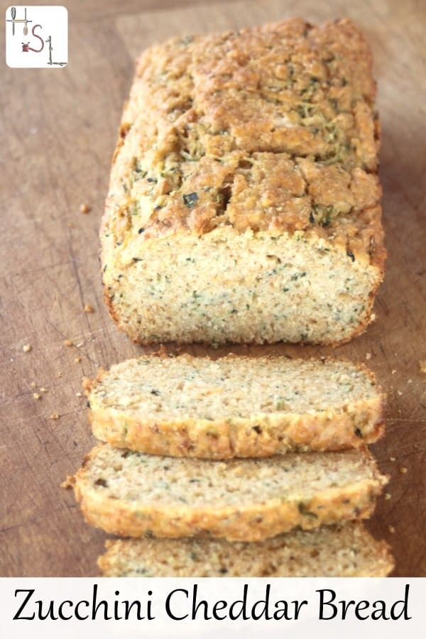 Use up the ever productive zucchini, even frozen shreds from the summer in this tasty, savory Zucchini Cheddar Bread that is a perfect side to many meals. 