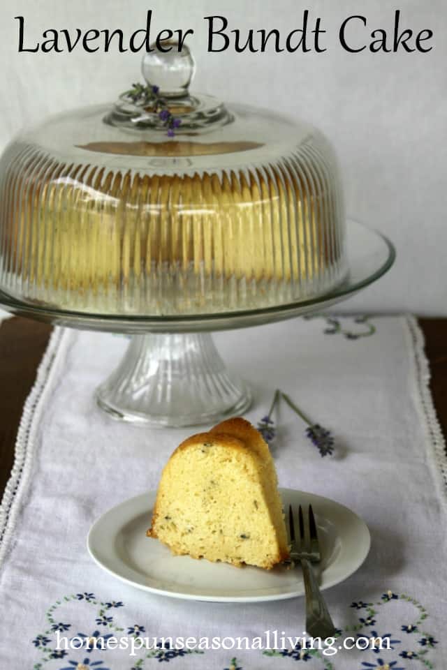 Lavender Bundt Cake on a cake plate with a slice.