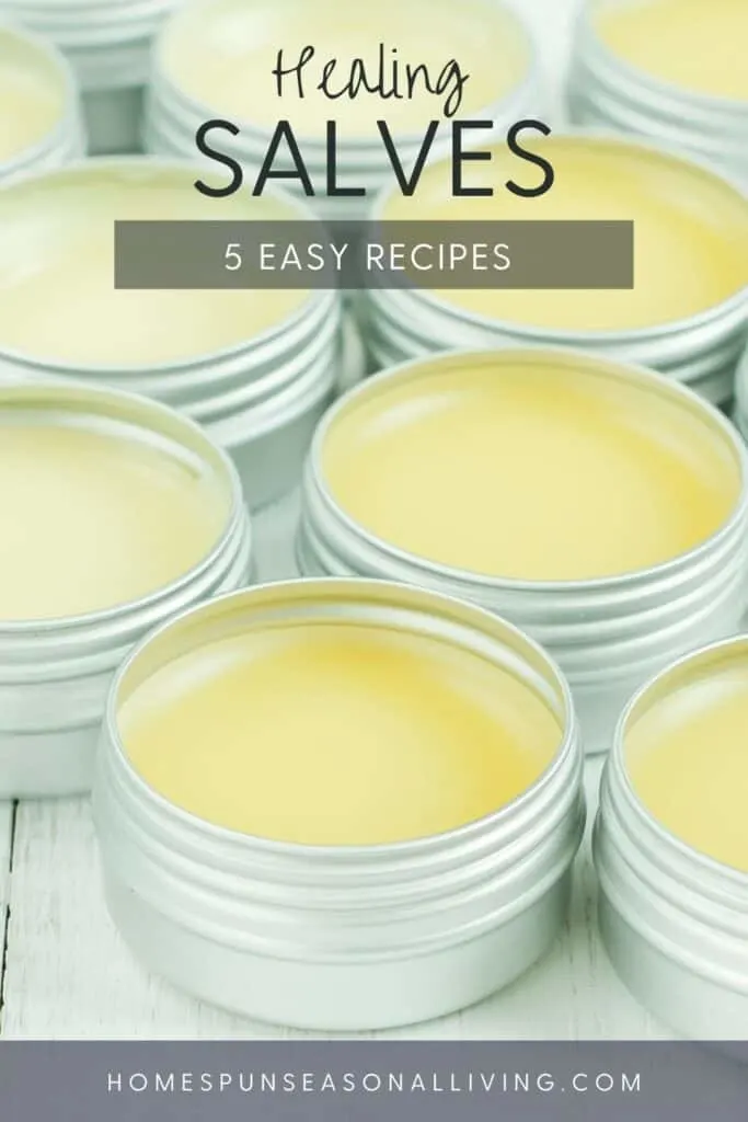 Metal tins without lids full of yellow salves with text overlay reading: healing salves 5 easy recipes.