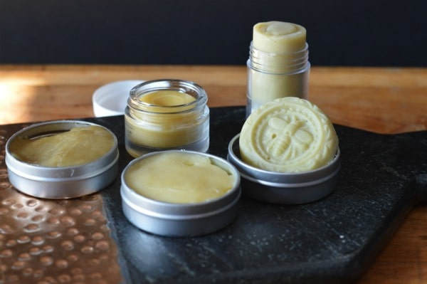 Make 5 healing salves in one afternoon with the weeds from your garden to treat bug bites, chapped skin, sunburn, sore muscles, and bruises.