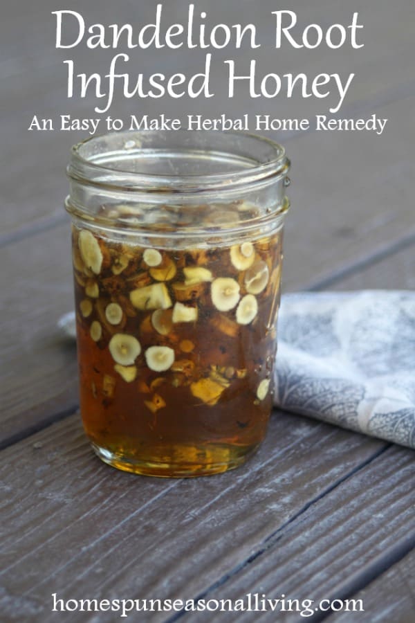 A jar of dandelion root infused honey sitting on a table with a napkin.