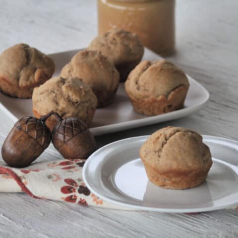 Applesauce muffin on a plate.