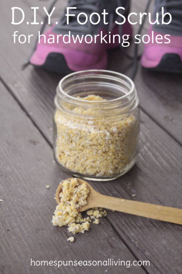 DIY foot scrub in a jar with wooden spoon.