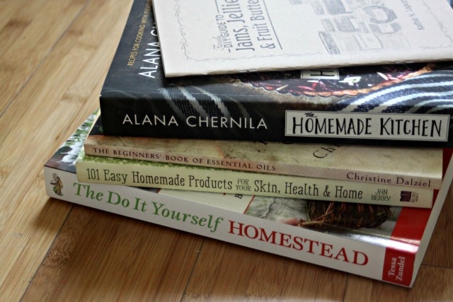 A stack of books on cooking and homesteading.