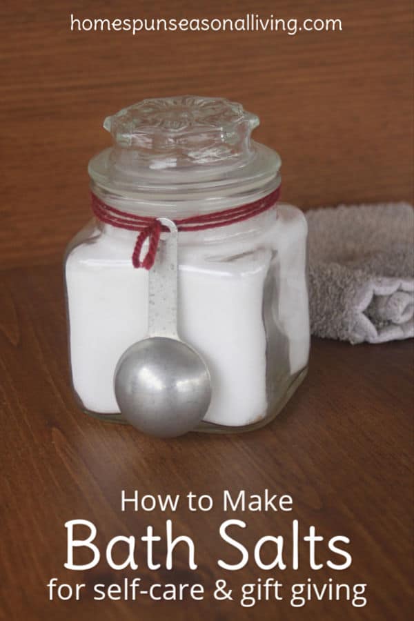 Jar of bath salts with a tablespoon tied to it.