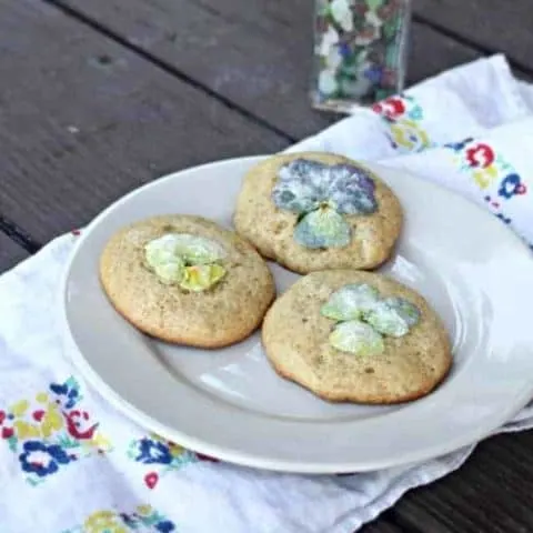 Use the edible flowers of summer as delightful decorations on easy to whip up pansy cookies that are as tasty as they are beautiful.
