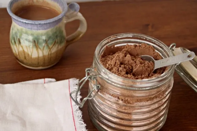 Homemade cocoa mix is a frugal, and easy way to spread cheer and give meaningful gifts any time of year but especially so when the temperature dips.