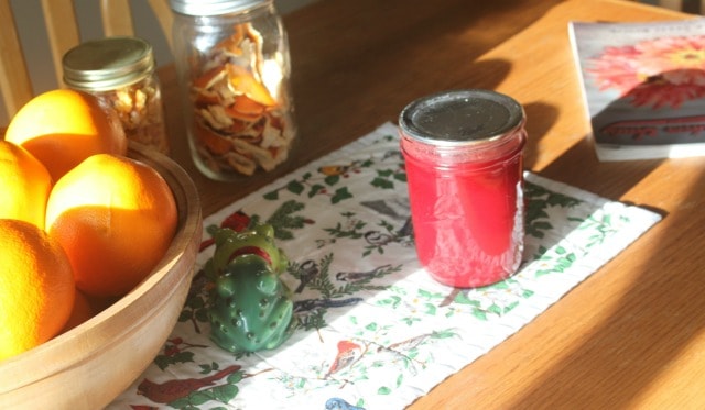 Table with oranges and jam.