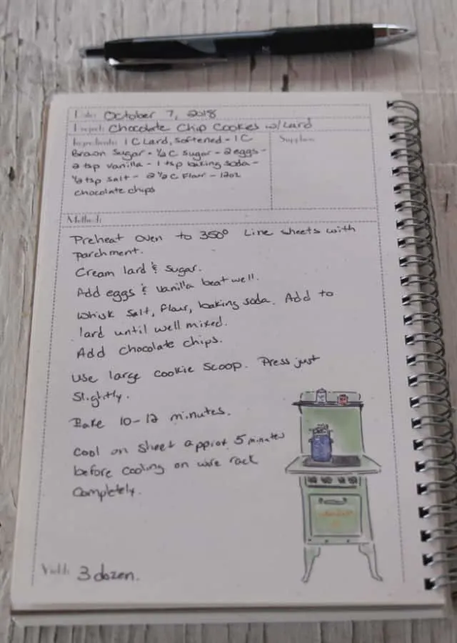 A page in a recipe book with a handwritten recipe for chocolate chip cookies. 