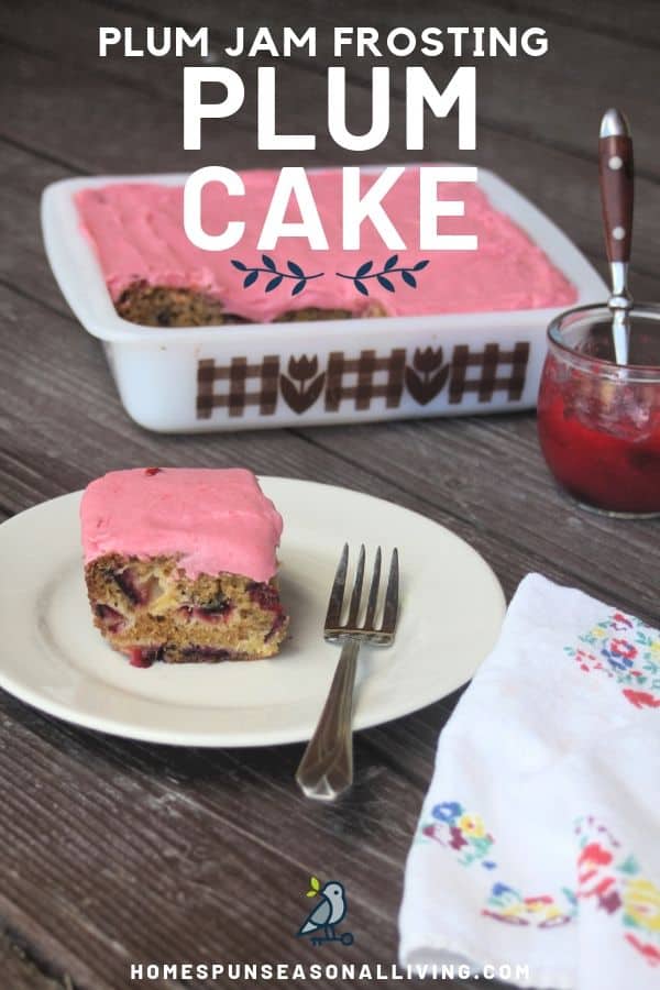 A slice of plum cake with plum jam frosting on a plate with a fork and napkin.