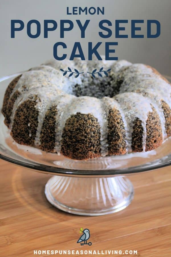 Glazed lemon poppy seed cake on clear glass cake stand with text overlay.