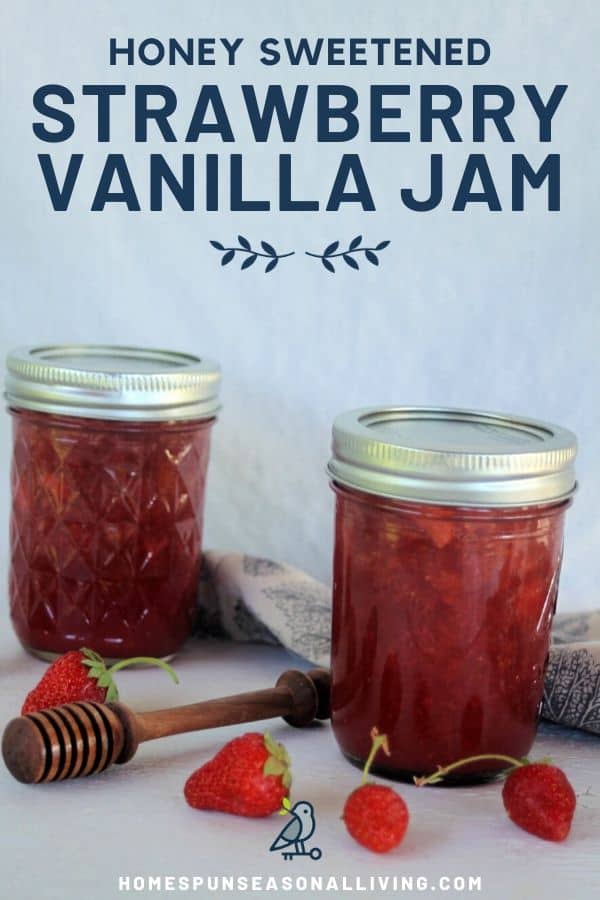 Two jars of strawberry jam on a table with fresh strawberries, a honey dipper, and cloth napkin with text overlay.