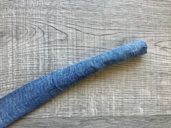 Fabric strip being turned right side out