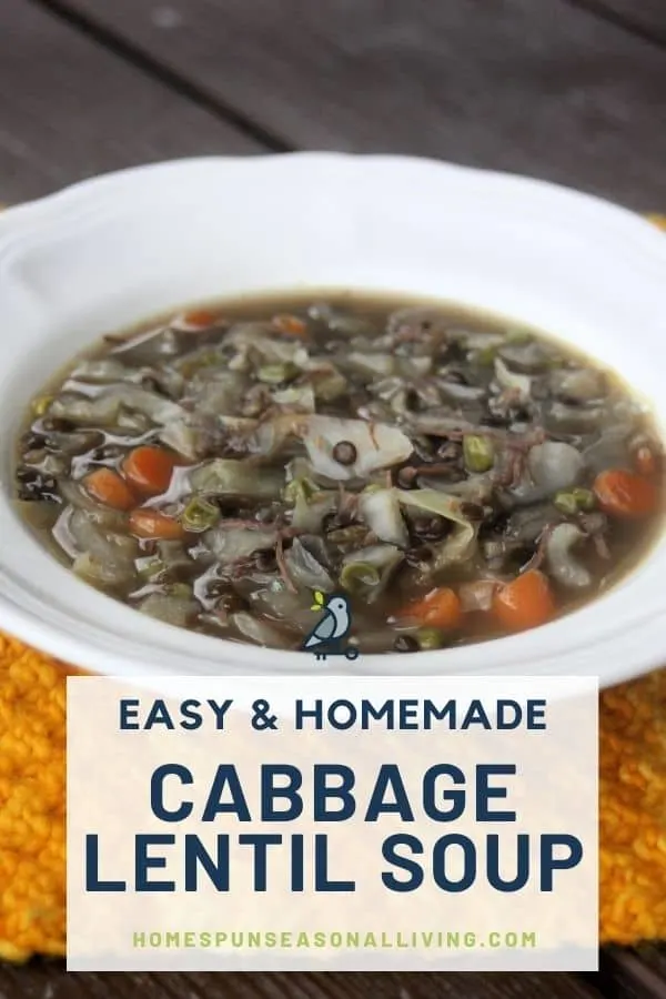 A white bowl full of cabbage lentil soup sitting on an orange table runner with text overlay reading: easy & homemade cabbage lentil soup.