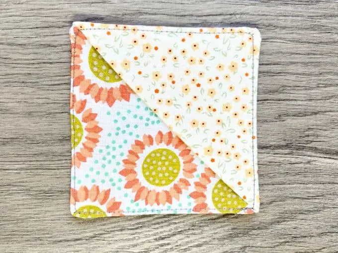 Completed fabric corner bookmark with top stitching all the way around