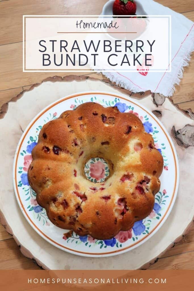 A bundt cake sitting on a floral cake plate as seen from above. Text overlay reads: Homemade Strawberry Bundt Cake.