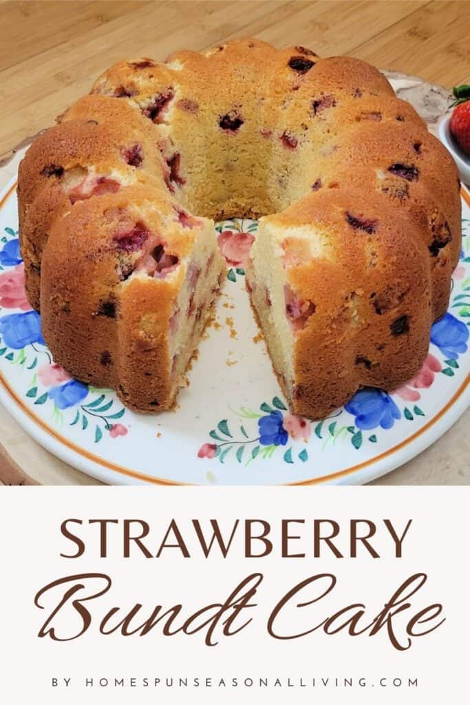A bundt cake with a slice missing sitting on a floral cake plate. Text overlay reads: Strawberry Bundt Cake.