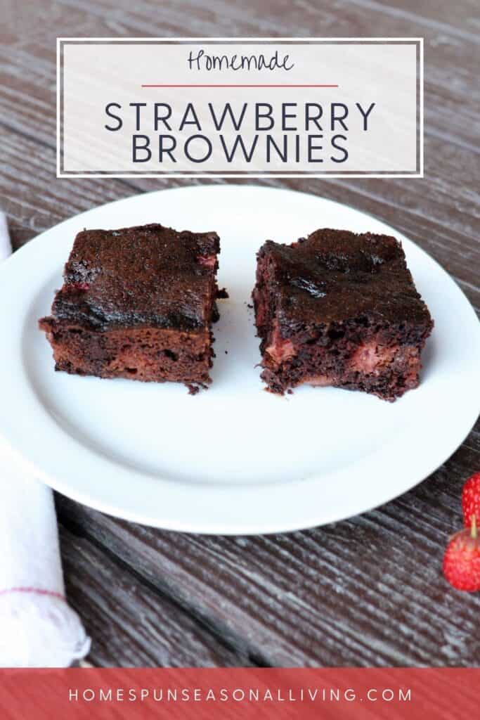 Two brownies on a plate exposing red bits of strawberries inside. Text overlay reads: Homemade strawberry brownies.