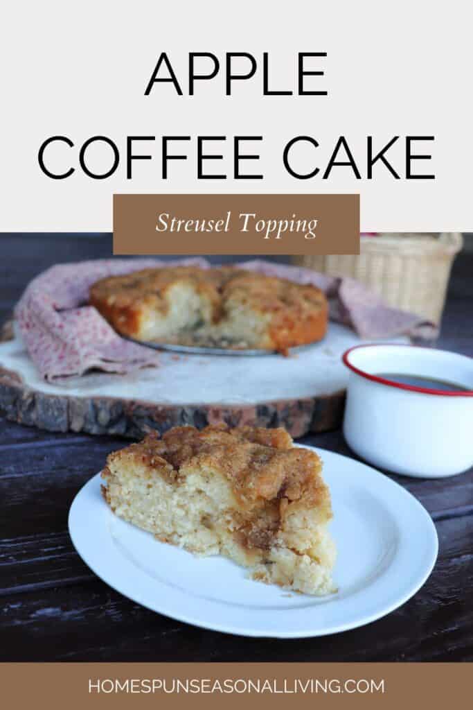 A slice of apple coffee cake sits on a plate. A red and white mug full of coffee sits next to it. The remaining cake sits on a board in the background. Text overlay reads: Apple Coffee Cake.