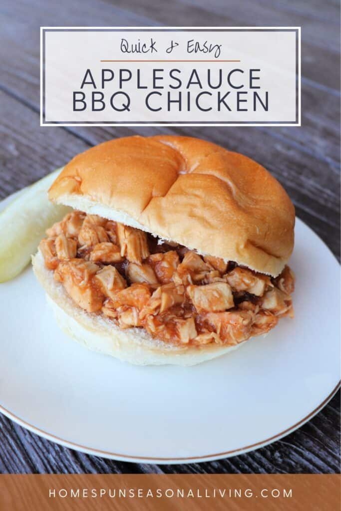 A bun with chicken covered in sauce in between., a pickle spear sitting on the plate. Text overlay reads: quick & easy applesauce bbq chicken.