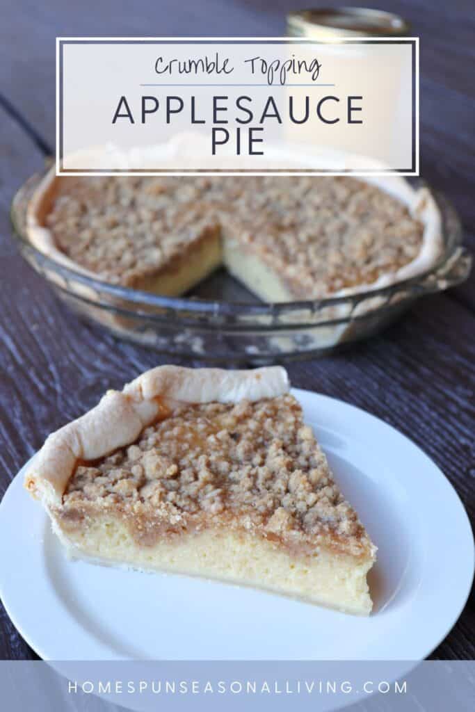 A slice of pie with crumble topping on a plate with the remaining pie in the background. Text overlay reads: Applesauce Pie Crumble Topping