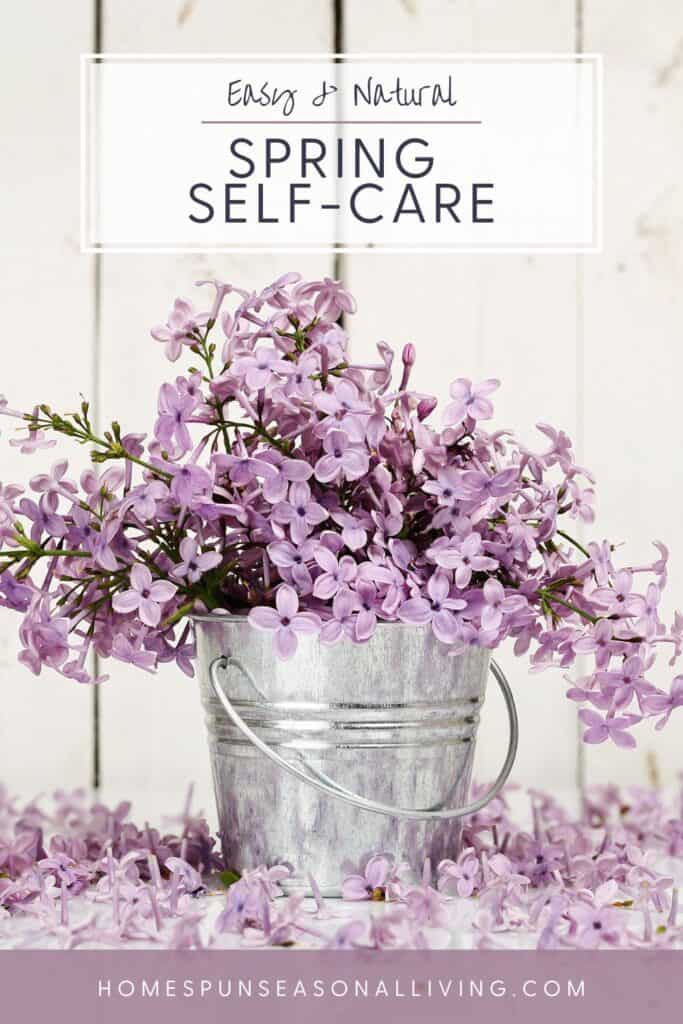 A metal bucket full of lilac blossoms with text overlay that reads: Simple & Natural Spring Self-Care.