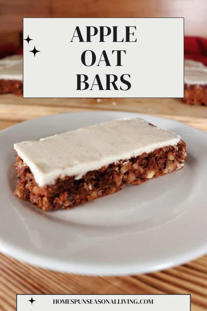 An apple oatmeal bar with thin caramel frosting sits on a plate. A platter with more bars can be seen in the background. Text overlay box reads: Apple Oat Bars. 