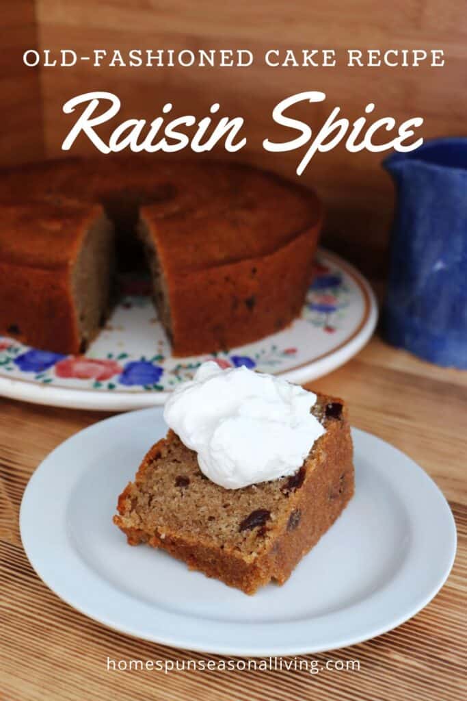 A slice of cake with whipped cream on top sits on a plate. The remaining cake sits in the background with a blue pitcher. Text overlay reads: Old-fashioned cake recipe Raisin Spice.
